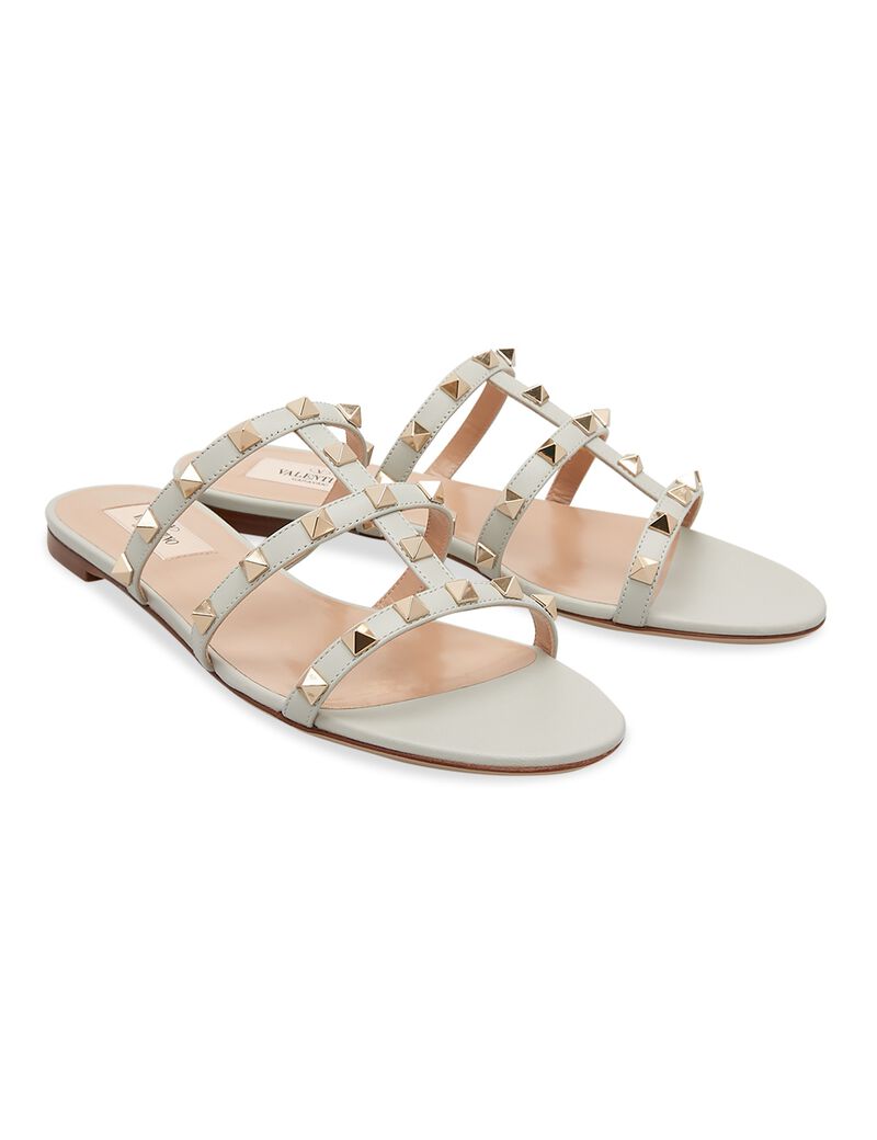 tryano com تسوق صندل مسطح بتفاصيل معدنية من فالنتينو غارافاني بسعر 2350 00 توصيل مجاني tryano com الإمارات